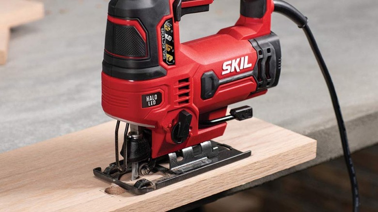 Skil jigsaw on a wooden board