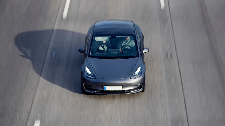 a Tesla on the road