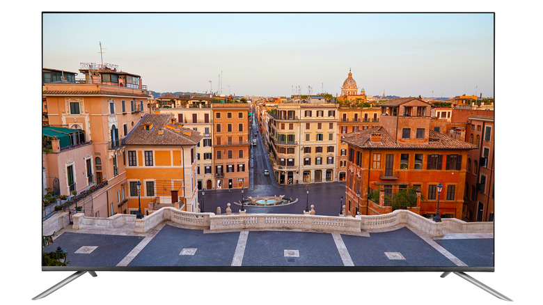 8K TV showing buildings