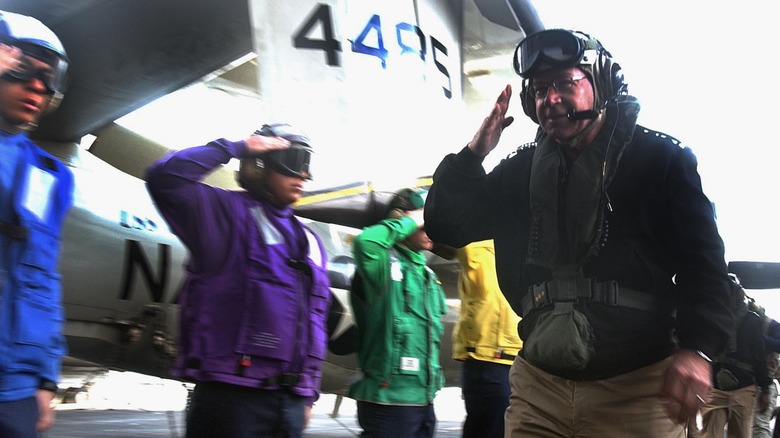 US Navy sailors saluting