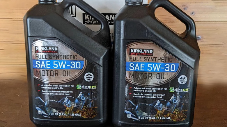 Two bottles of Kirkland oil