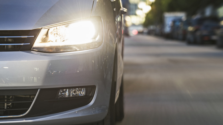 closeup of lit car headlight