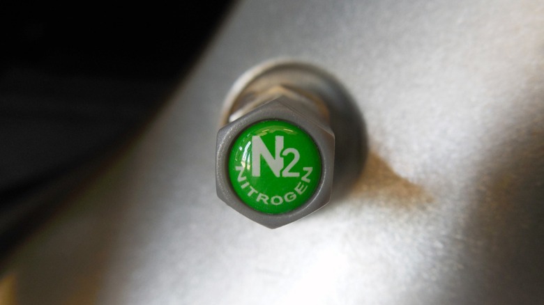 A green nitrogen valve stem cap showing N2