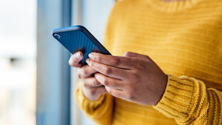 Person using smartphone