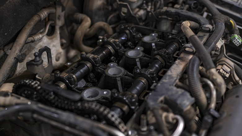 Dirty engine covered in oil and gunk