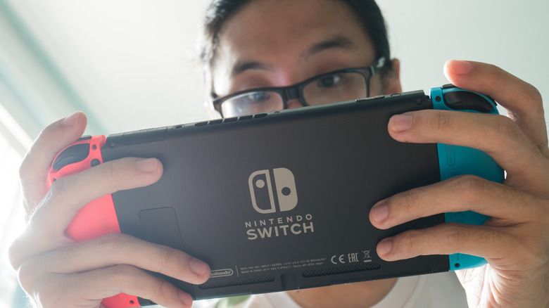 Person playing Switch