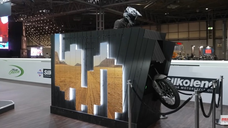 The new Kawasaki KLE adventure bike teaser display at EICMA  2024.