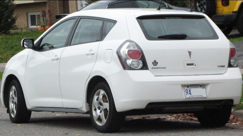 white Pontiac Vibe rear view