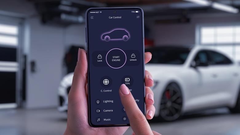 Person starting their car remotely with a smartphone app