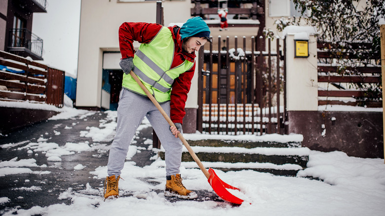 Person shoveling snow