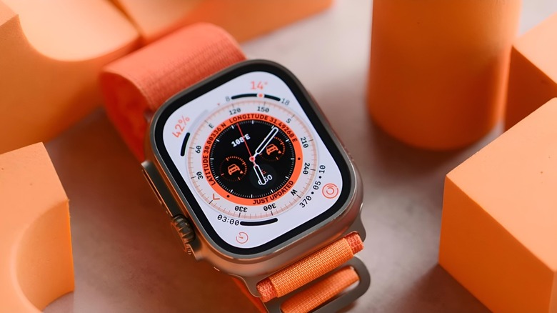 Apple Watch Ultra smartwatch with an orange band