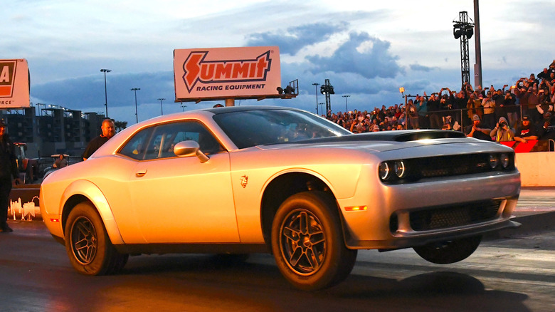 Dodge Demon 170 taking off at drag track