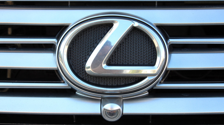 The Lexus logo on a car's grill.