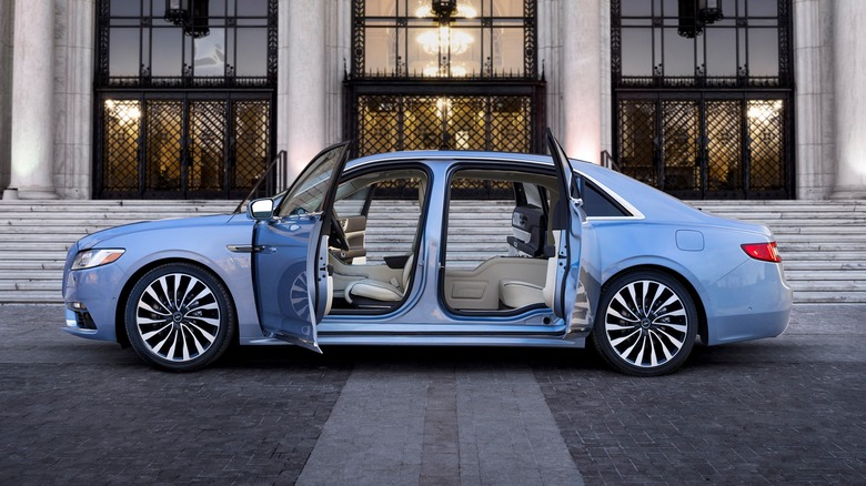 Blue 2019 Lincoln Continental Coach Door Edition parked in front of building