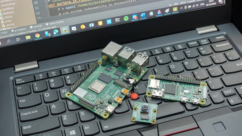 Different Raspberry Pi boards on a laptop