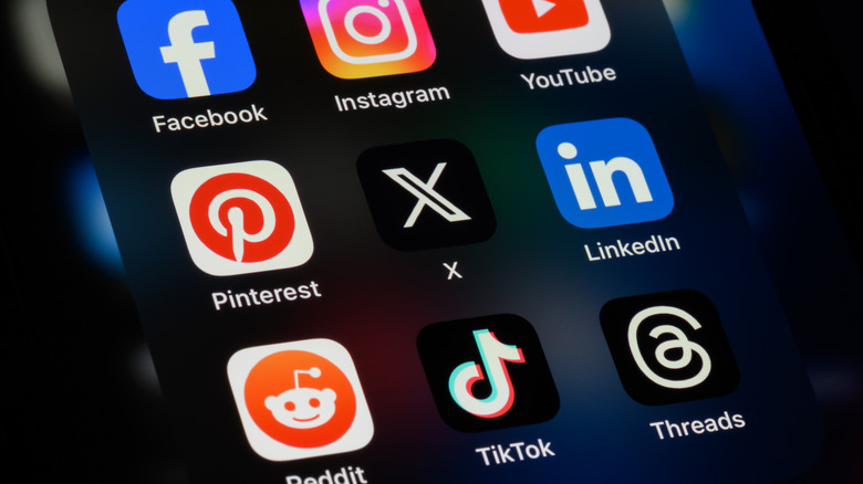 Social media app icons on a smartphone screen