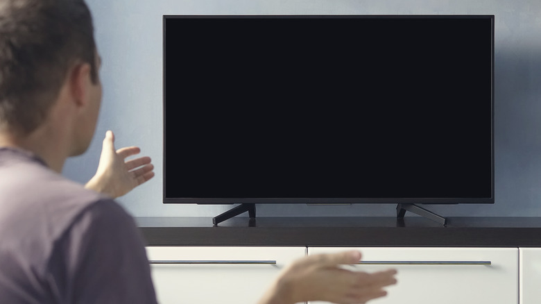 Man frustrated with TV