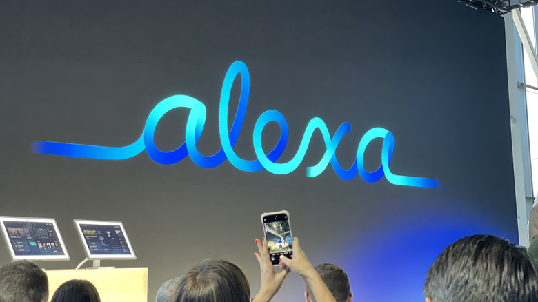 New cursive Alexa logo on black background.