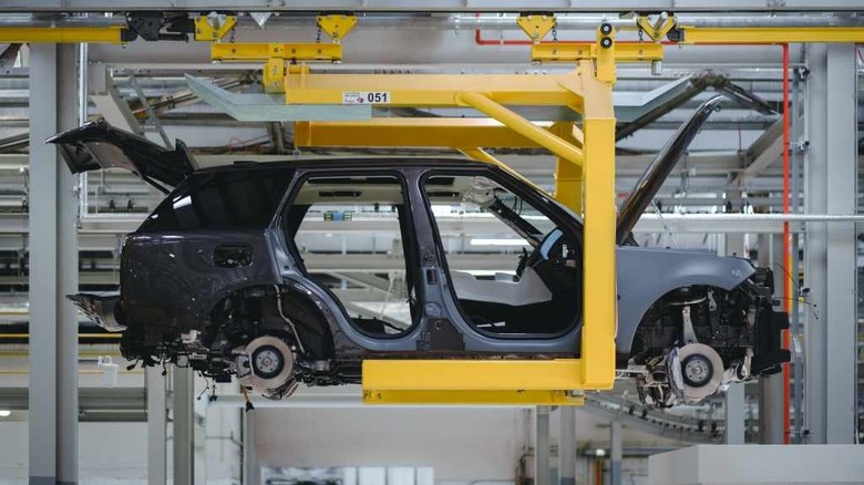 land rover vehicle on assembly line