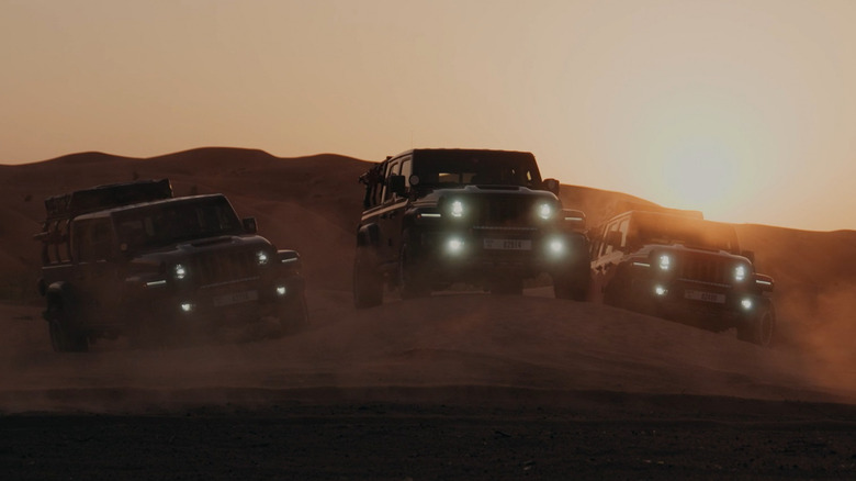 Three Jeep Gladiator's on a sand dune