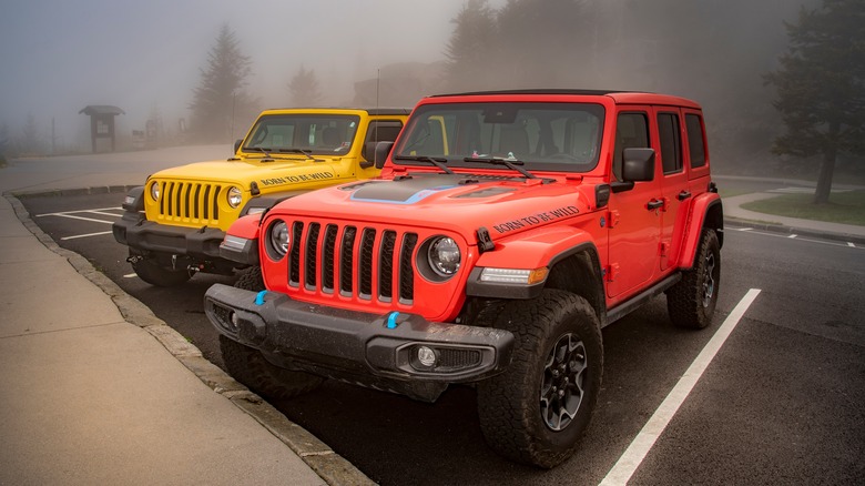 Two Jeeps in a parking lot