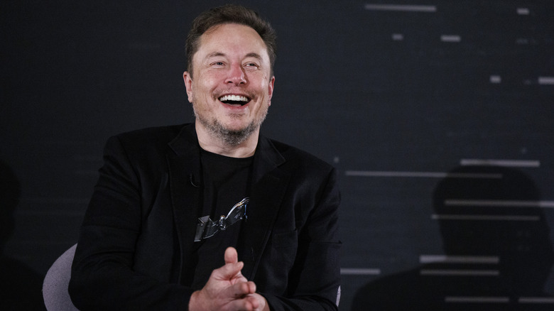 Elon Musk laughing