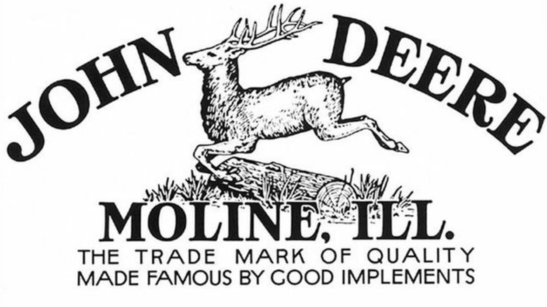 The John Deere logo used from 1910 to 1936, with a deer and the words "John Deere, Moline, Ill., the trade mark of quality made famous by good implements."