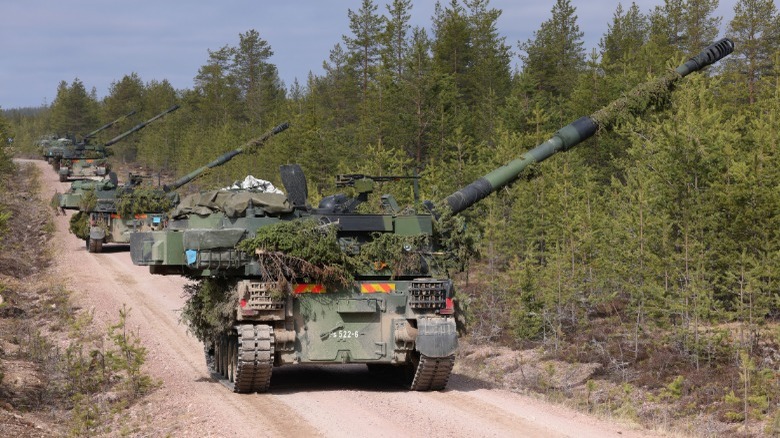 Finnish K9 Thunder Howitzers driving down a road for a test drill