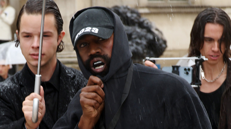 Kanye West in the rain