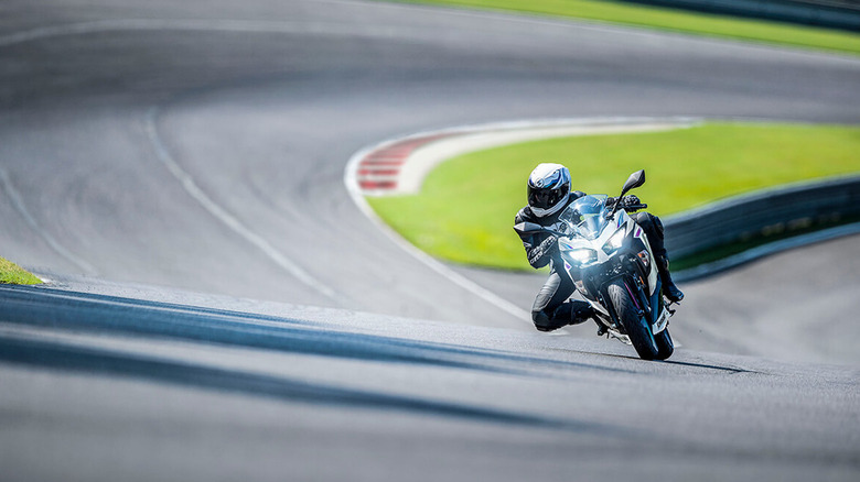 person riding kawasaki ninja 400