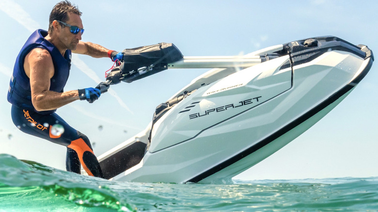 Person riding a Yamaha SuperJet on the water