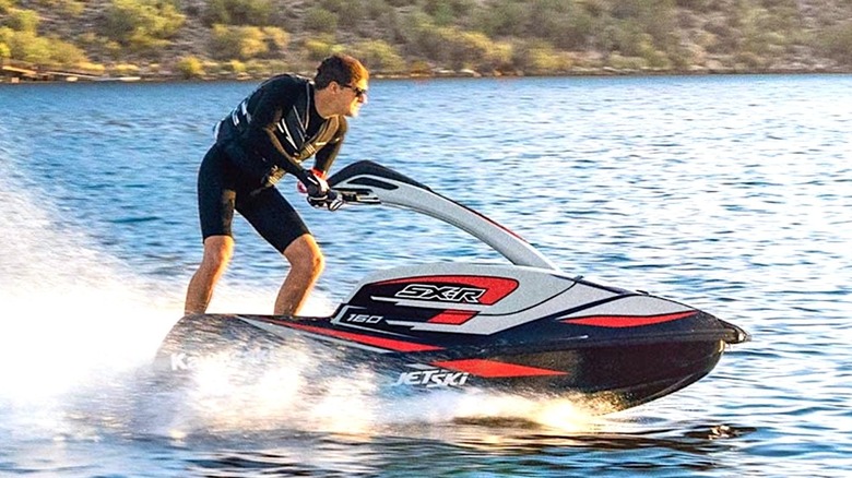 Person riding a Kawasaki SX-R Jet Ski on the water