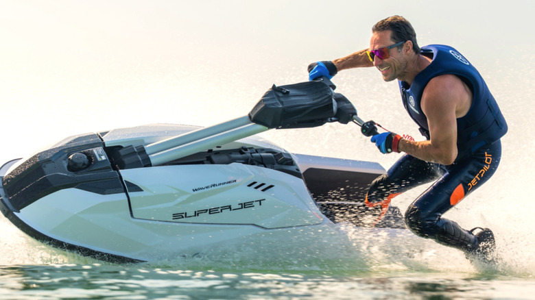 Person riding a Yamaha SuperJet on the water