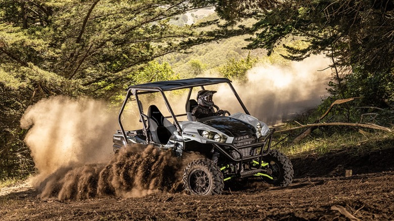 Kawasaki Teryx kicking up dust on the trail