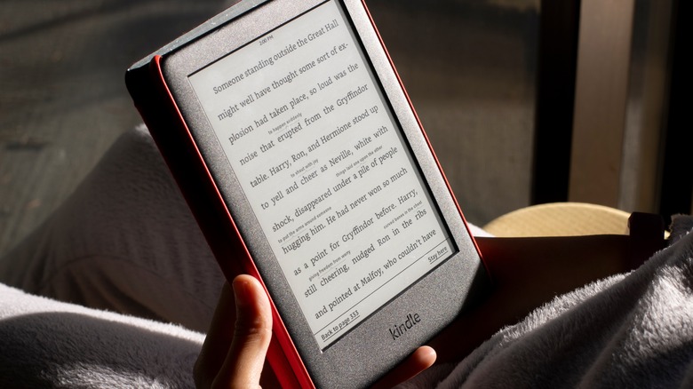 Person reading Kindle