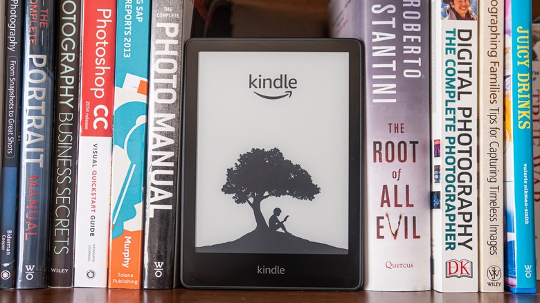 Kindle on bookshelf