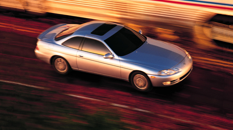 Lexus SC 300 first-gen driving at speed