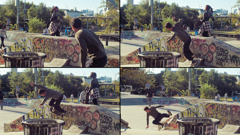 Skateboarder doing a trick and bailing