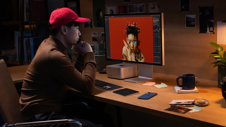 person using Mac studio computer