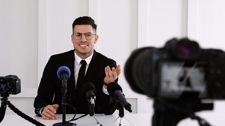 man giving an official interview