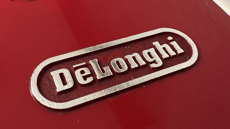 De'Longhi logo on espresso machine