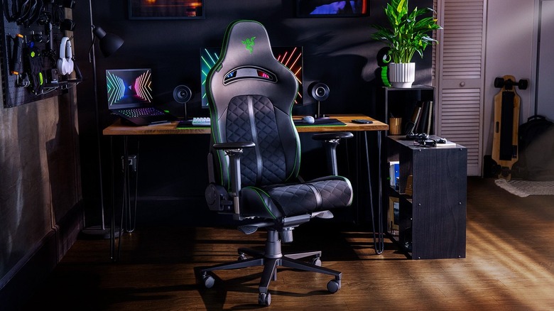 A Razer Enki in a room with a desk and a computer.