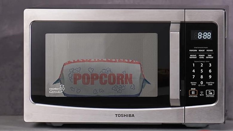 A Toshiba Microwave Loaded with Popcorn