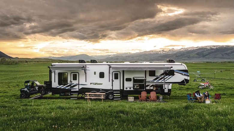 Keystone RV in a field of grass