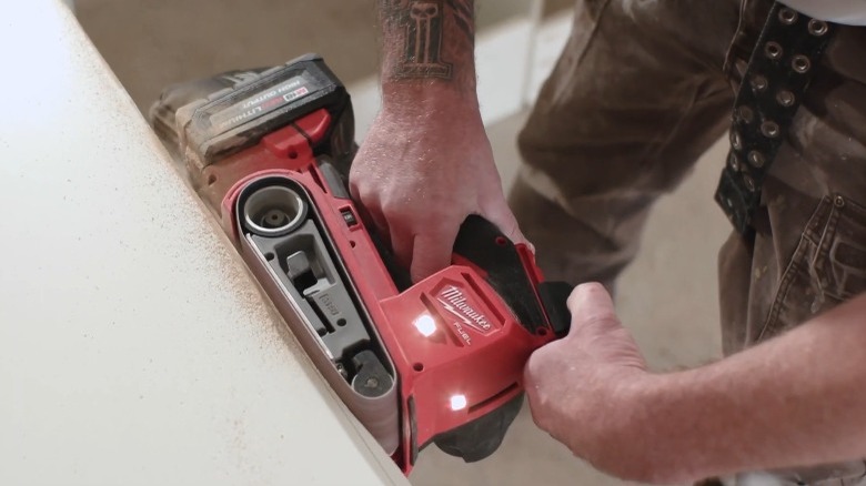 Milwaukee belt sander sanding counter