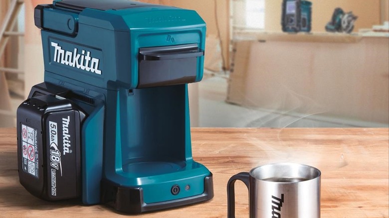 https://www.slashgear.com/img/gallery/makitas-mobile-coffee-maker-is-perfect-for-your-camping-trip/intro-1697469511.jpg