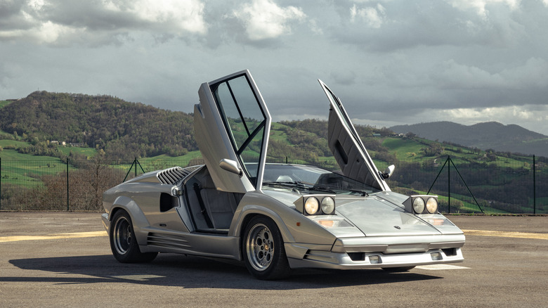 The Lamborghini Countach with its iconic doors opened skyward.