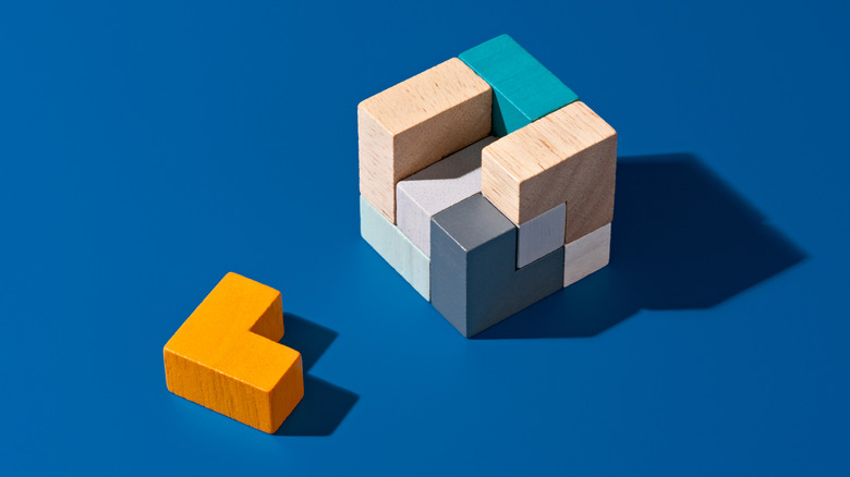 A block puzzle with a piece removed