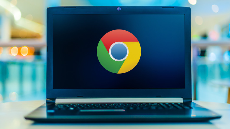 Laptop displaying Google Chrome logo