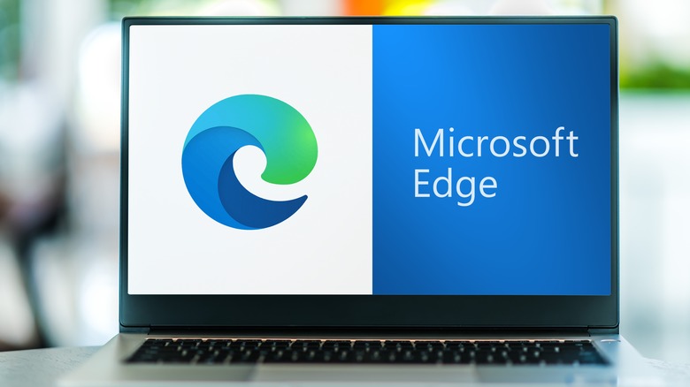 Laptop displaying Microsoft Edge logo